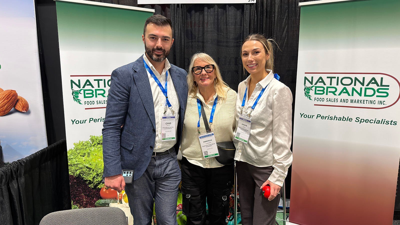 Chantelle Cleghorn (center) of Fresherized Foods flanked by Chad and Jordan Boule of National Brands Food Sales and Marketing Inc.