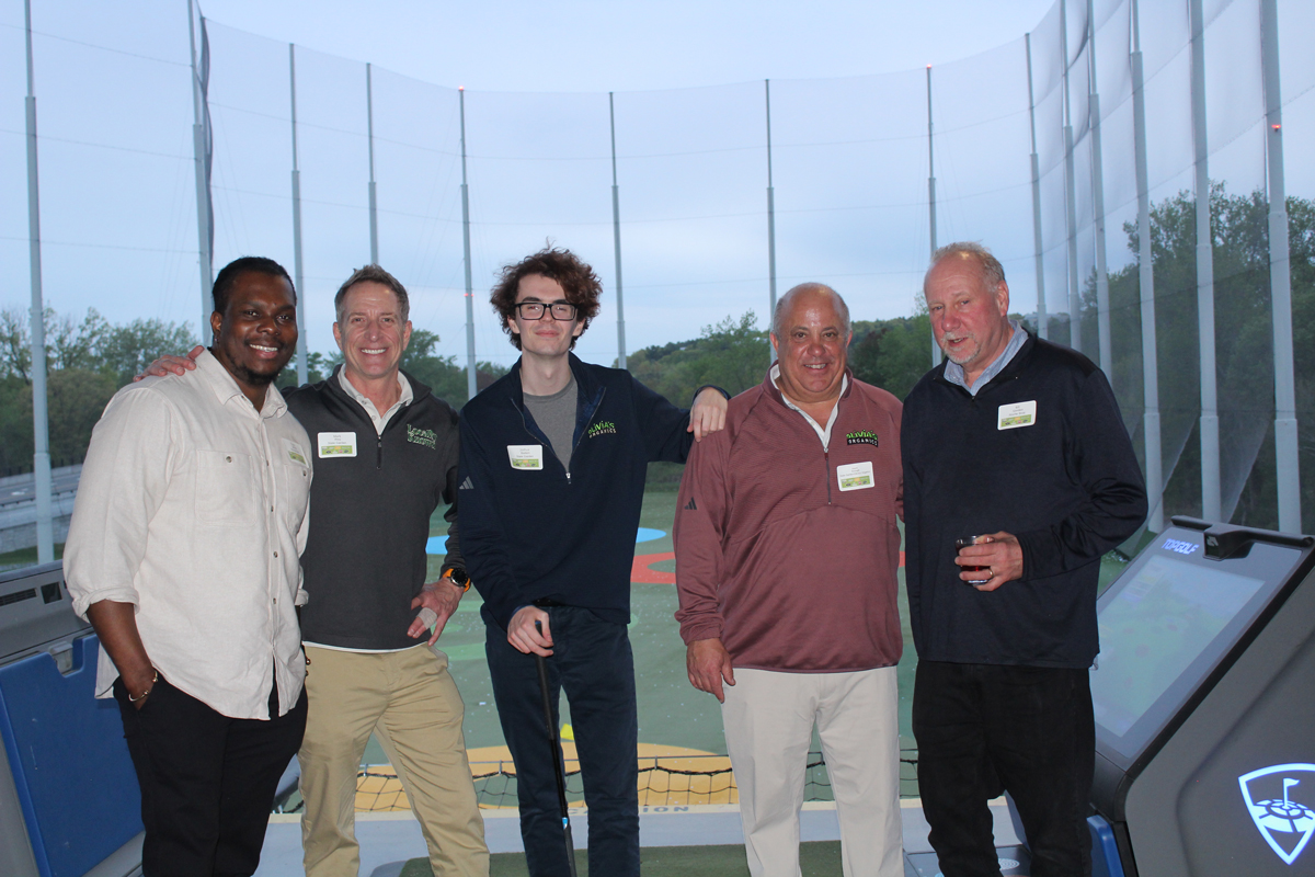 Travis Boyle of Roche Bros., with Mark Pins, Joshua Badem and Kevin Keough of State Garden Inc./Olivia's Organics and Bill Gordon of Roche Bros.