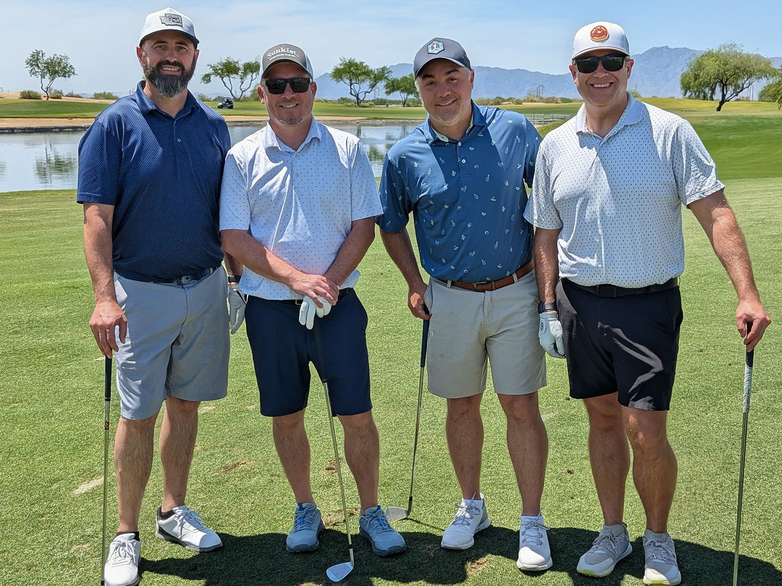 Daniel Spivey of Sprouts, Billy Martin and Jeff Moore of Crunch Pak, and Adam Severin of Wonderful Citrus.