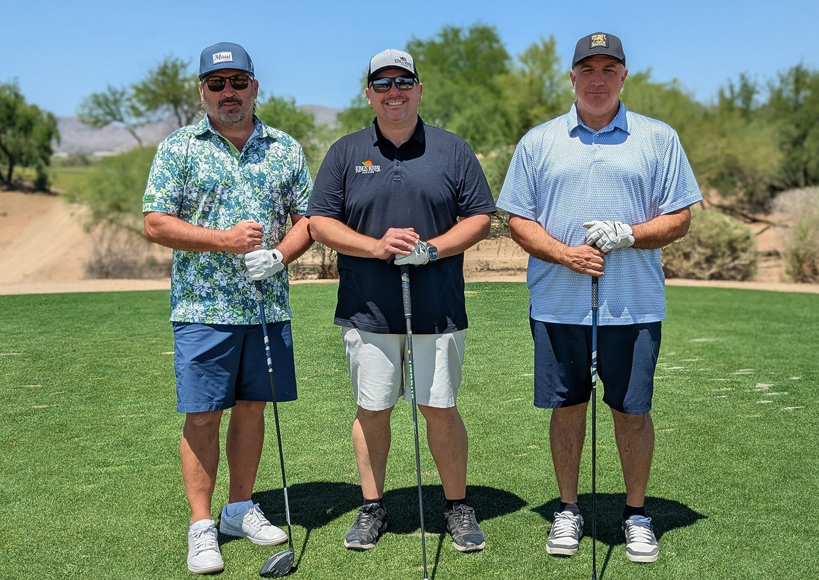Brano Popovac of Mahi Pono, Jesse Silva of Kings River Packing and JT Thomas of SourceOne Ag.