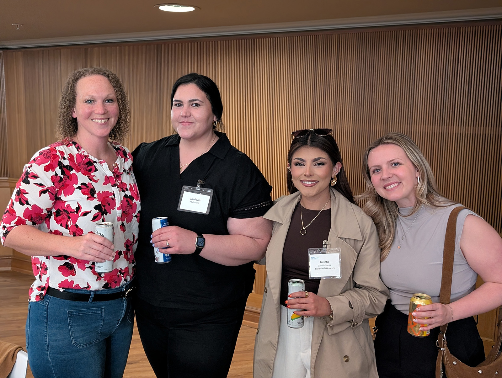 Molly Cochran of Superfresh Growers and Chafeka Abdellatif with Julietta Castillo and Syndey Remsberg of Superfresh Growers.