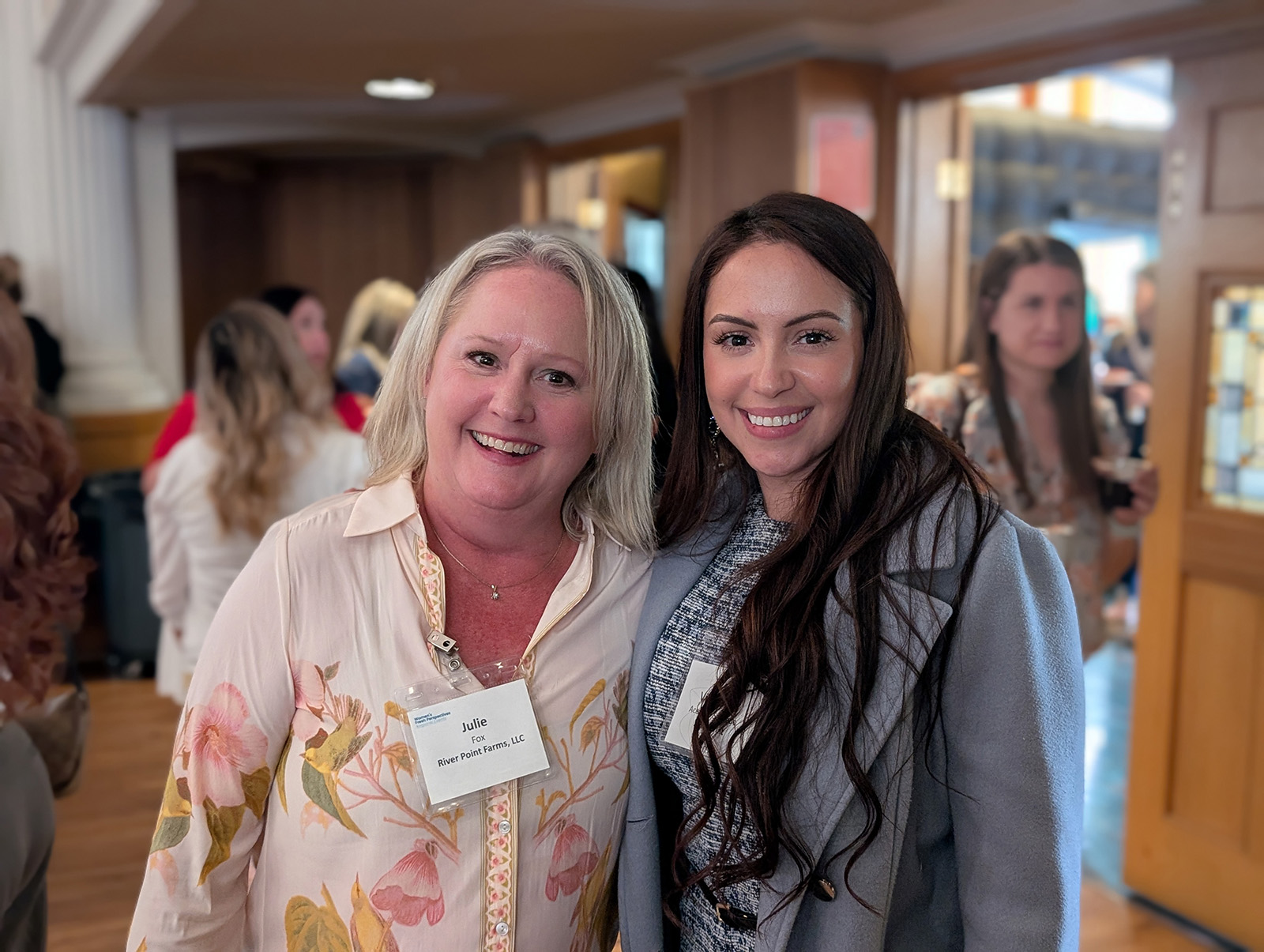 Julie Fox of River Point Farms and Viridiana Acevedo Saucedo of Zirkle Fruit.