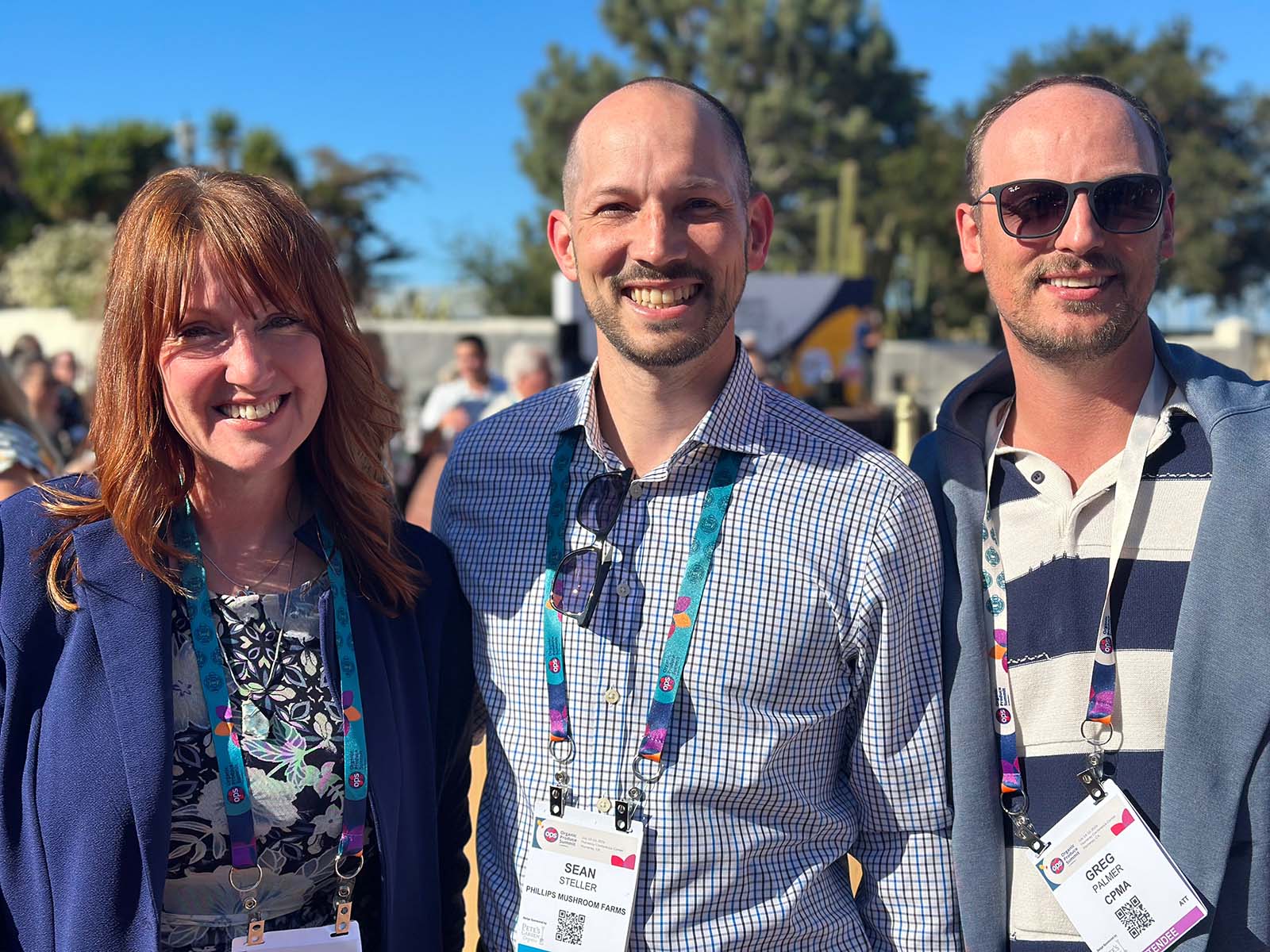 Larissa Rice and Sean Steller of Phillips Mushroom Farms with Greg Palmer of CPMA.