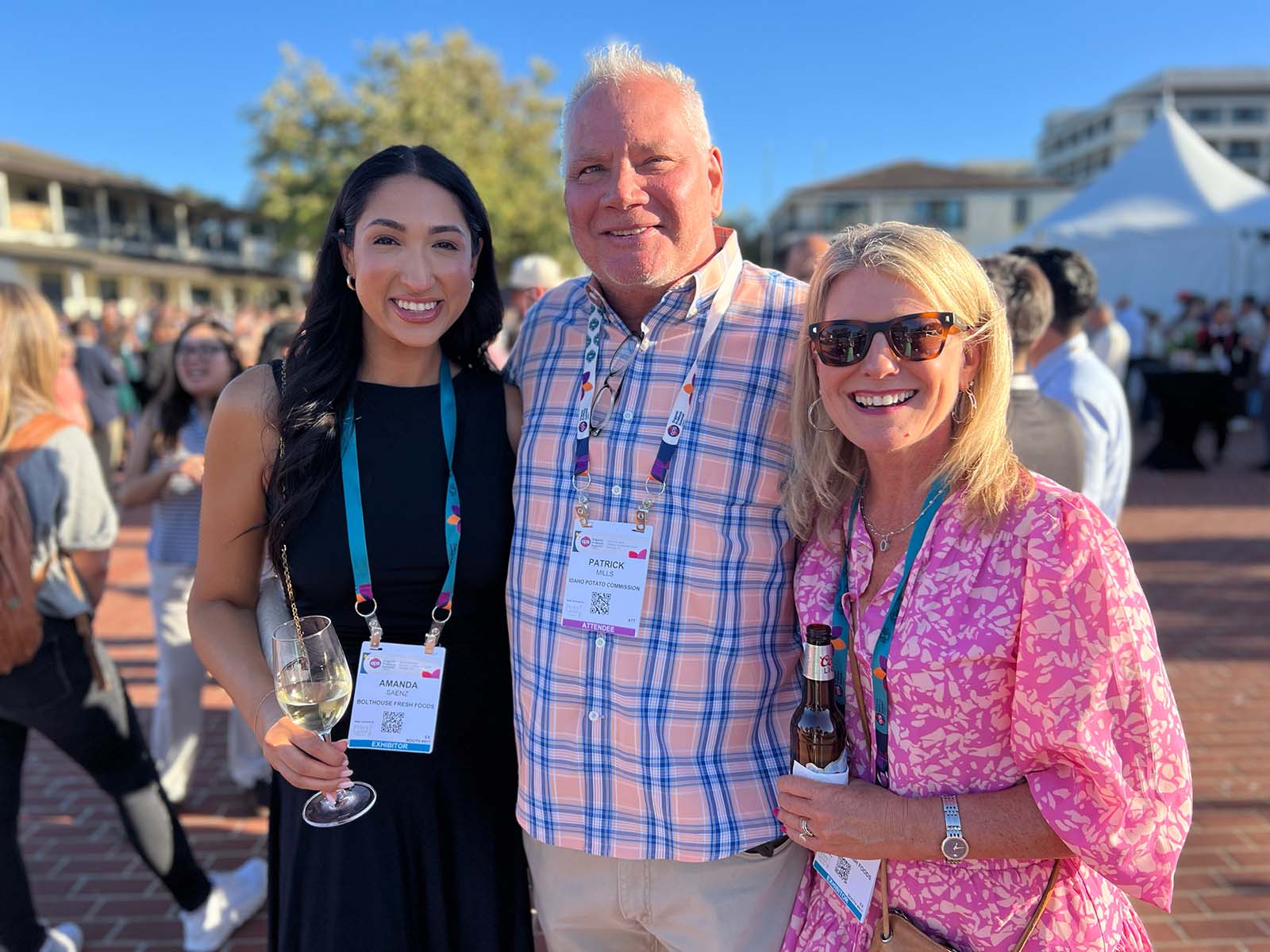 Patrick Mills of the Idaho Potato Commission flanked by Amanda Saenz and Kim St. George of Bolthouse Fresh Foods.