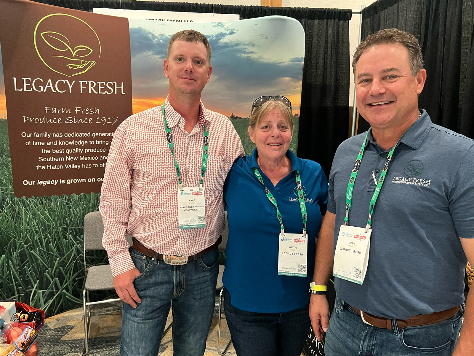 At the Legacy Fresh booth were Kyle Erstrom of Snake River Produce and Joyce Combs and Chris Franzoy of Legacy Fresh.