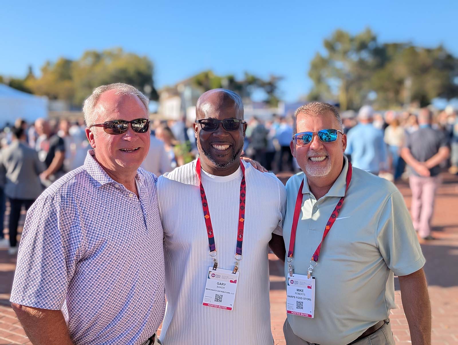Sloan Lott of Bland Farms with Gary Baker of Merchants Distributors and Mike Roberts of Harps Food Stores.