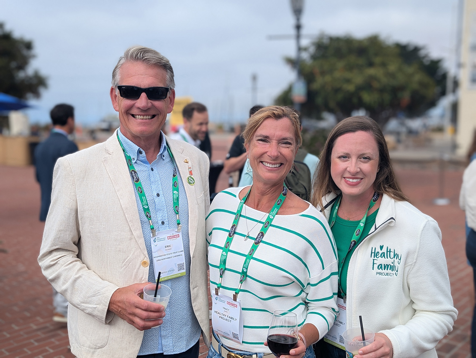 Eric Patrick of Northwest Cherries with Tracy Shaw and Aimee Smith of Healthy Family Project.