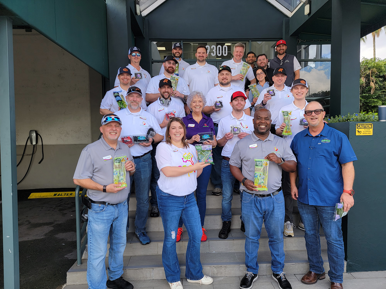  The STEP-UPP Retail class poses with Alpine Fresh and Hippie Organics products after an insightful tour from Chris Elmer and team. 