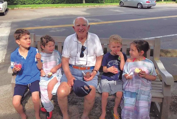 Sal eating ice cream with kids. 